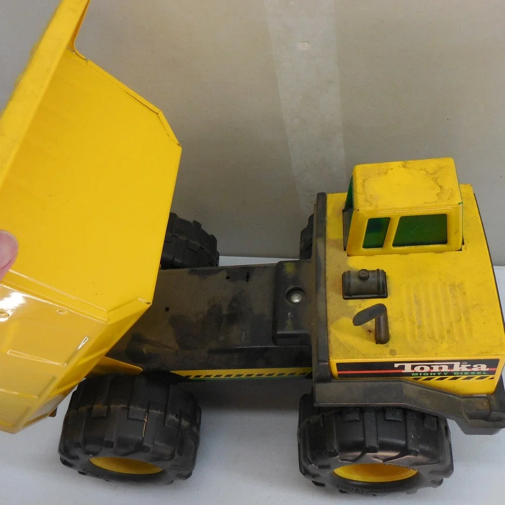 Vintage Tonka Mighty Diesel Dump Truck Yellow Pressed Steel Construction Toy